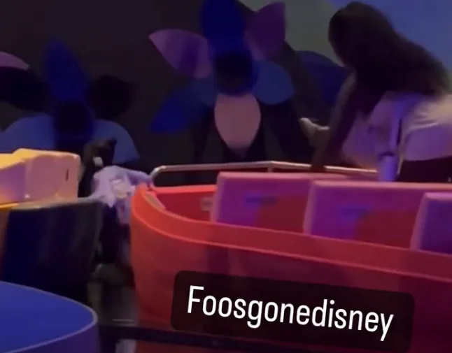 A woman is riding a ride at Walt Disney World.