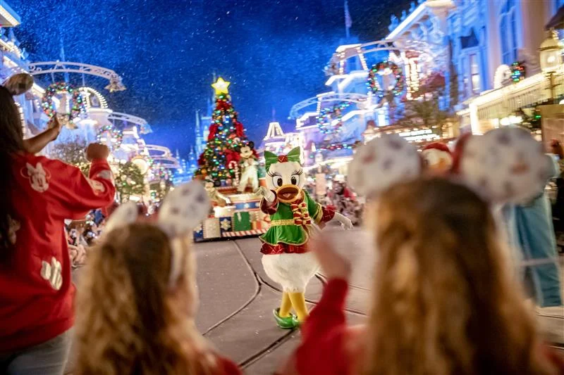 Daisy Duck in the Christmas parade near Cinderella Castle