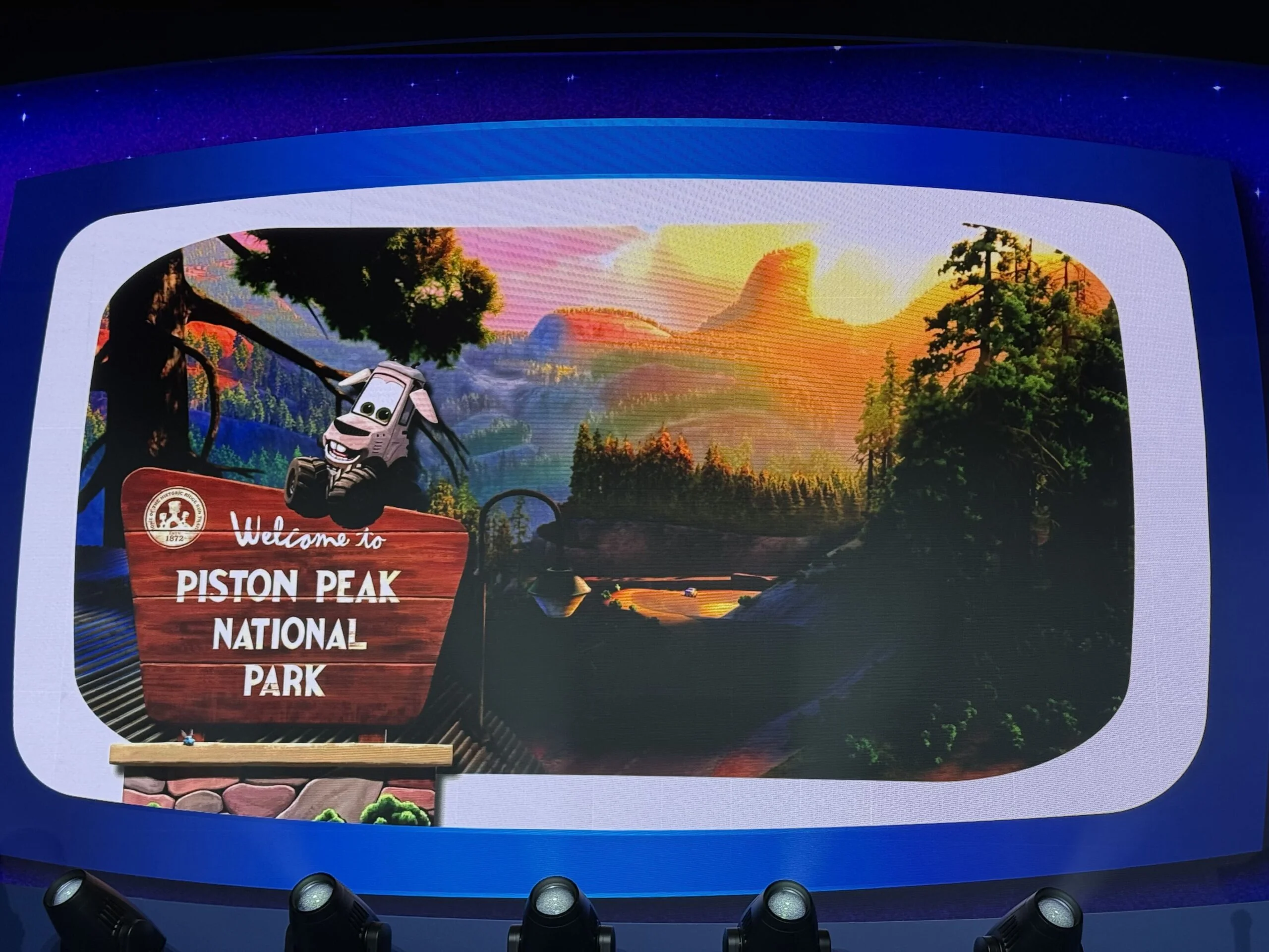 Concept art for Piston Peak National Park at Magic Kingdom